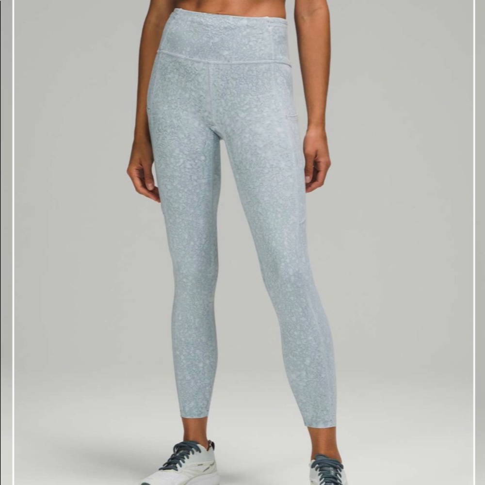 Lululemon Fast and Free Tight 25" *Nulux
City Grit White Blue Fog in size 4